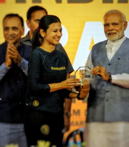 dr. pooja nadkarni felicitated by Prime Minister Narendra Modi for her first Indian woman doctor to successfully complete the Comrades Ultra Marathon